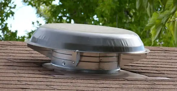 attic fan installation services with low-profile roof ventilation unit in Albany, NY