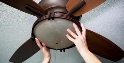 Ceiling fan repair and reinstallation on ceiling mount in Albany, NY