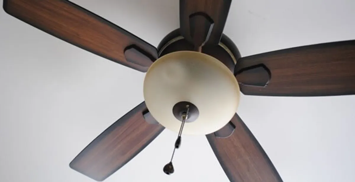 Fully installed ceiling fan with balanced blades and light fixture in Albany, NY