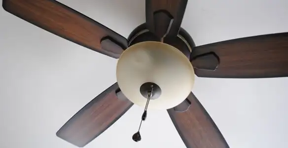 Fully installed ceiling fan with balanced blades and light fixture in Albany, NY