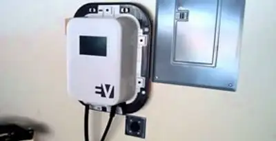 Electric car charger installation with wall-mounted EV charging station in Albany, NY