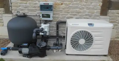electric heater installation services with connected outdoor heating system equipment in Albany, NY
