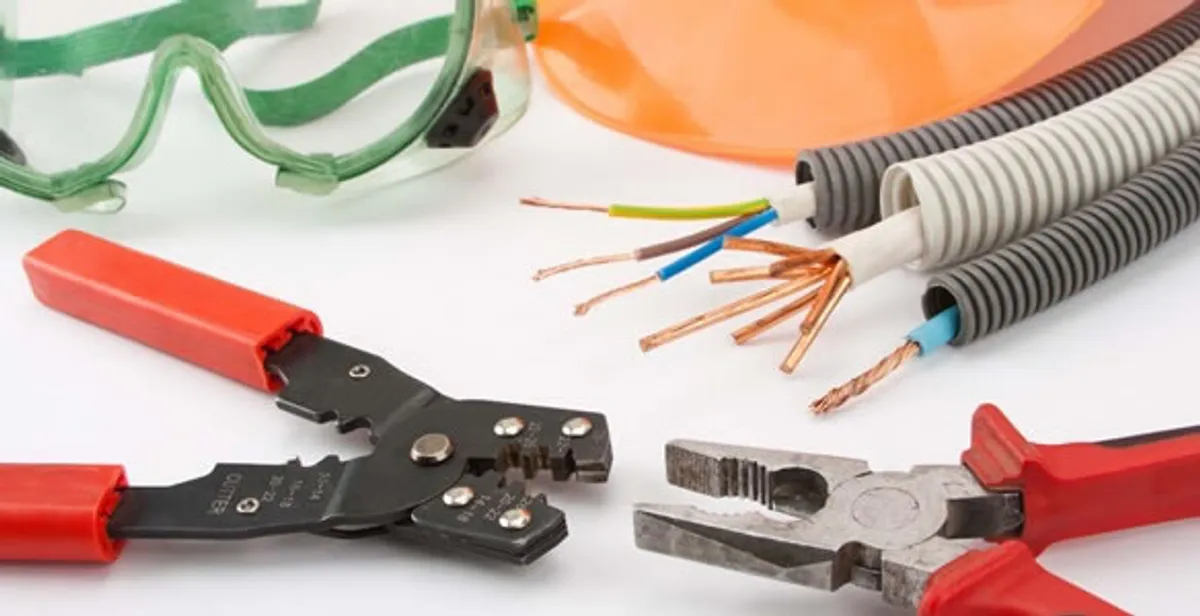 Electrical wiring repair with professional tools and safety equipment in Rensselaer, NY