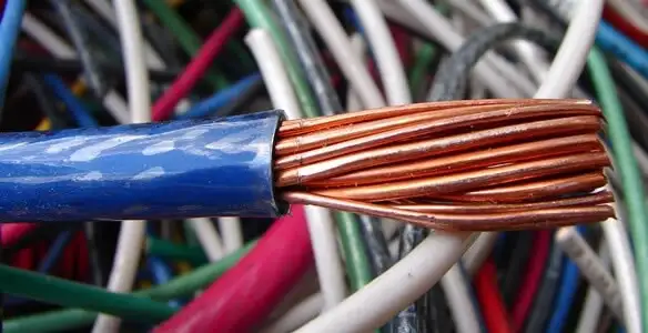 electrical wiring services showing exposed copper conductors and cable preparation in Albany, NY