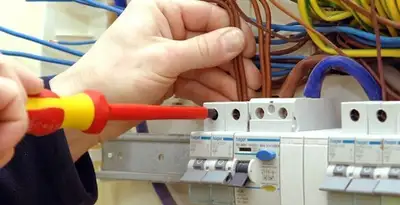 electrician services performing professional electrical panel wiring and connections in Albany, NY