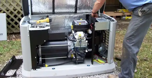 generator installation service showing technician connecting and configuring generator components in Albany, NY