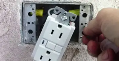 gfci circuits service showing installation of a ground fault circuit interrupter outlet by licensed electricians in Albany, NY