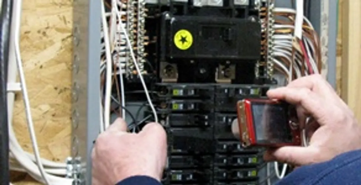 Home electrical inspection of circuit breaker panel by licensed electrician in Albany, NY