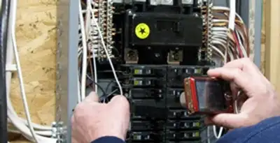 Home electrical inspection of circuit breaker panel by licensed electrician in Albany, NY