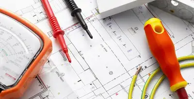 licensed electrician planning and testing electrical systems using professional tools in Albany, NY