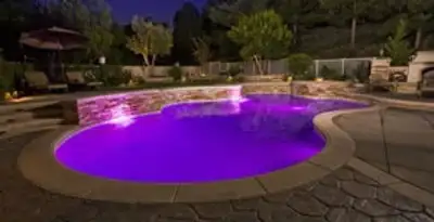 pool light installation and repair services illuminating a residential swimming pool in Albany, NY