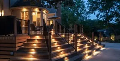Residential electrician installing outdoor lighting for home safety in Albany, NY