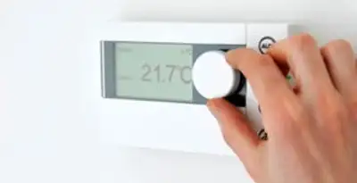Thermostat installation service with professional adjusting temperature control in Albany, NY