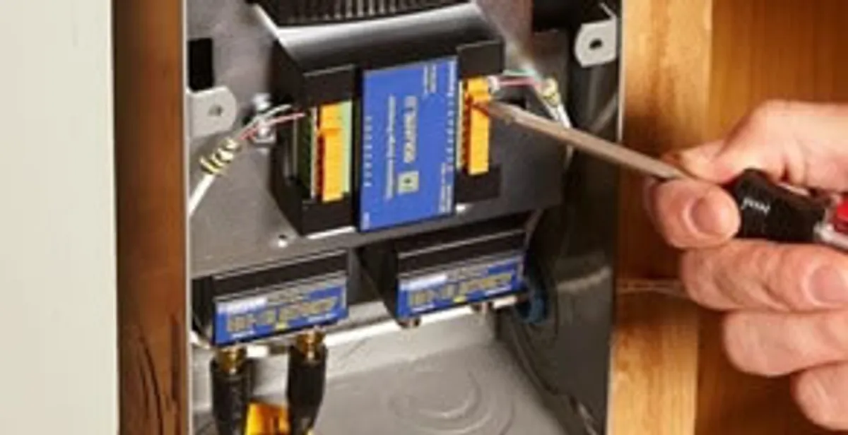 Whole home surge protection device being installed by a licensed electrician to protect electrical systems in Albany, NY